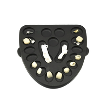 LaminateButler dental organizer tray with restorations and tools.